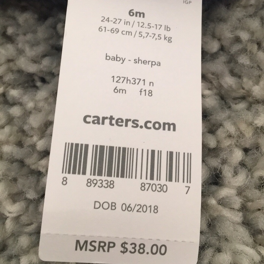 Brand new never been worn Carter’s onesie
